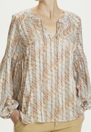 Leichte, mehrfarbige Bluse mit V-Ausschnitt, Ballonärmeln und einem Rautenmuster in Beige-, Blau- und Brauntönen. Weiche Textur.