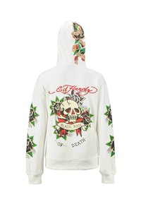 Sudadera blanca con capucha, con un gráfico de calavera y rosa negra, acentos coloridos y texto "Ed Hardy" en la espalda y las mangas.