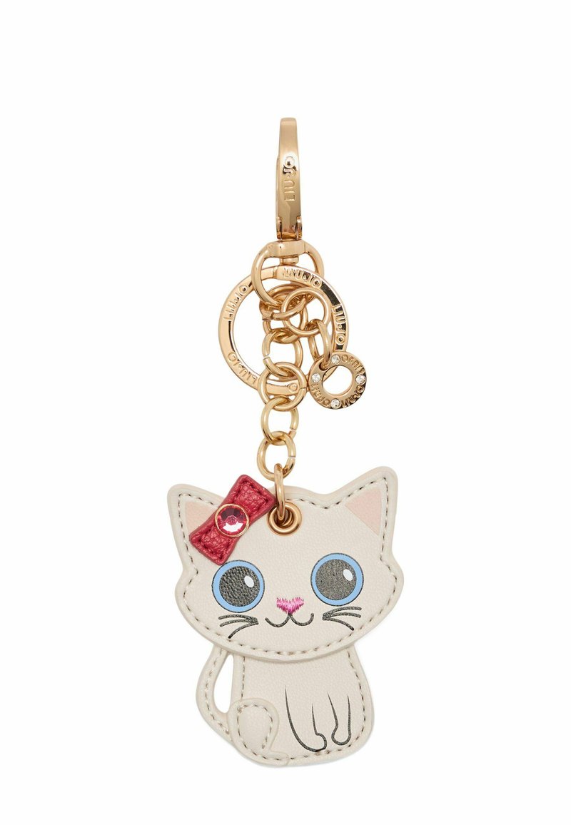 Portachiavi a forma di gatto, realizzato in morbida pelle color crema, con occhi blu, naso rosa e un fiocco rosa con dettagli accentuati.