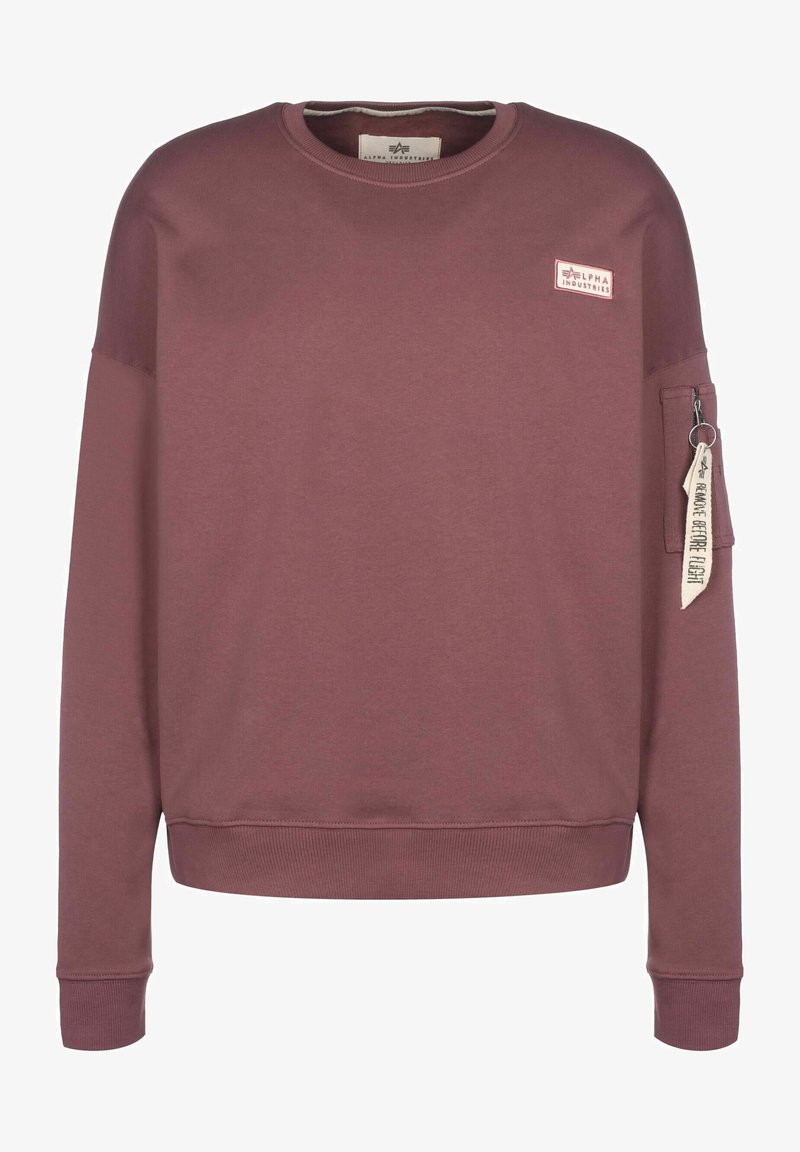 Bordeauxroter Sweatshirt aus weichem Stoff, mit Rundhalsausschnitt, langen Ärmeln, gerippten Bündchen und Saum sowie einer seitlichen Tasche mit Reißverschluss.