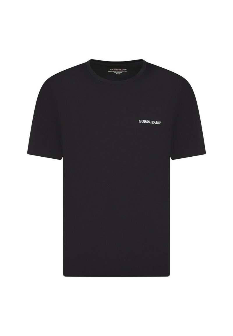 T-shirt en coton noir à manches courtes, col rond, avec un petit logo blanc "GUESS JEANS" sur la partie gauche de la poitrine. Texture lisse.