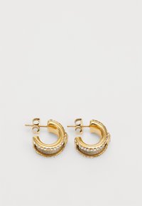 Gold hoop earrings with a textured finish, featuring a row of small clear crystals along the edge and a stud backing.