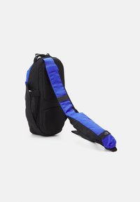 The North Face BOREALIS SLING - Hátizsák - solar blue-tnf black
