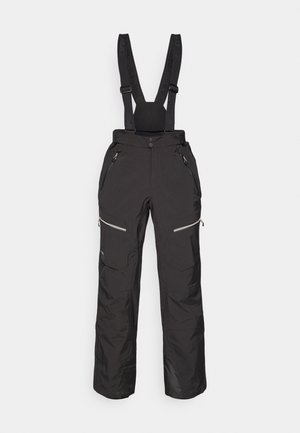 Fekete vízálló hónadrág állítható pántokkal, két cipzáras zsebbel és laza illeszkedéssel. Megerősített szegélyekkel és sima felülettel rendelkezik.