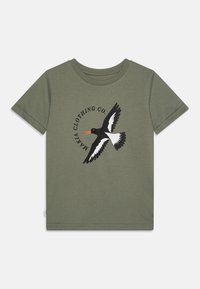 Olive green cotton t-shirt featuring a black and white bird graphic with an orange beak and the text "MAKIA CLOTHING CO." above it.