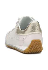 White leather sneaker with a gold metallic accent at the heel, rubber sole, perforated detailing, and textured gum outsole.