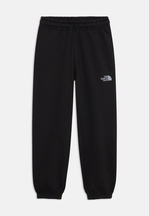 The North Face REFLECTIVE LOGO JOGGER UNISEX - Pantalon de survêtement - black