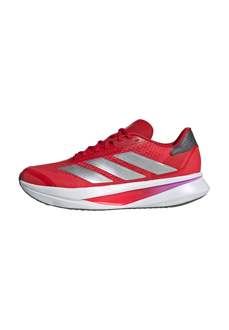 Red athletic shoe with a mesh upper, silver stripes, black accents, and a white foam midsole. Features a slight heel and textured tread.