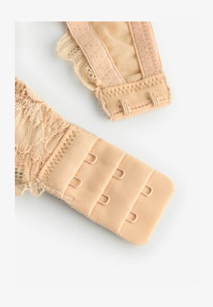 Beige pitsiliste ja kangast rinnahoidja rihm konksudega, millel on tekstureeritud disain ja sakilised ääred detaili jaoks. Nähtav tugevdusõmblus.