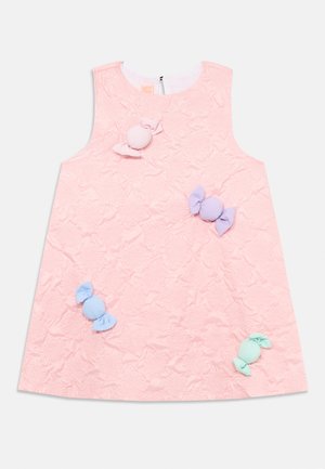 Pink sleeveless dress with textured fabric features colorful candy-shaped appliqués in lavender, blue, and mint-green. Back keyhole closure.