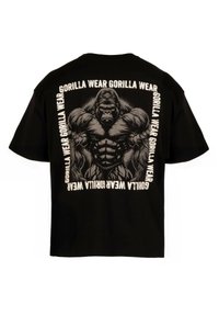 T-shirt graphique en coton noir avec un grand motif de gorille au dos et le texte "GORILLA WEAR" en lettres blanches en gras.