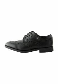 Chaussure de ville en cuir noir avec une finition lisse, dotée de motifs brogue, d'un bout rond et de lacets pour un bon maintien. Semelle basse et texturée.