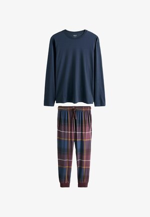 Granatowa bluzka z długim rękawem połączona z spodniami w wielokolorową kratę, z paskiem ze sznurkiem i elastycznymi mankietami. Wykonana w całości z bawełny.