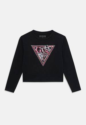 Sweatshirt noir raccourci avec un design graphique triangulaire comprenant des lettres multicolores et des embellissements au centre. Manches longues.