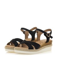 Sandalias de ante negro con tacón de cuña, que presentan un diseño de tiras cruzadas, correa en el tobillo con hebilla y una media suela envuelta en yute.