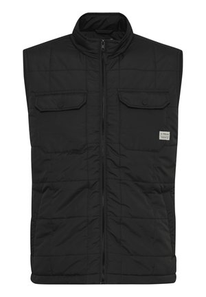 Gilet imbottito nero con colletto alto, zip frontale e due tasche sul petto. Presenta una texture trapuntata e un'etichetta del marchio in basso a destra.