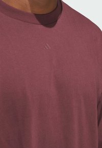 adidas Performance BASKETBALL LONG SLEEVE - Maglietta a manica lunga - aurora ruby