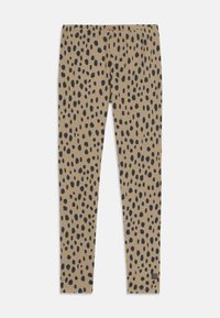 Leggings in denim beige con stampa leopardata nera, caratterizzati da una vita elasticizzata e un design aderente. Tessuto morbido in tutto il capo.