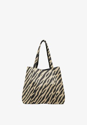 Grote beige draagtas met zwarte zebraprint, voorzien van stevige handvatten en een gladde textuur, ontworpen voor veelzijdig gebruik.