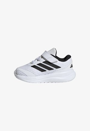 Białe i czarne dziecięce buty sportowe Adidas z siateczkową cholewką, trzema czarnymi paskami, zapięciem na rzep oraz amortyzowaną podeszwą z oznaczeniem Cloudfoam.