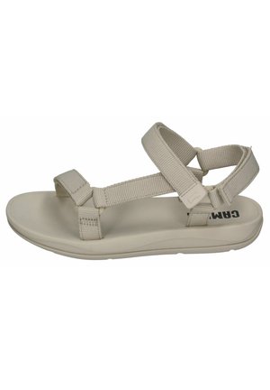 Sandale beige à bout ouvert avec des brides en tissu réglables autour de la cheville et des orteils, semelle coussinée avec un léger soutien de la voûte plantaire.