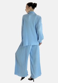 Elara LANGESSET - Pantalon classique - blau