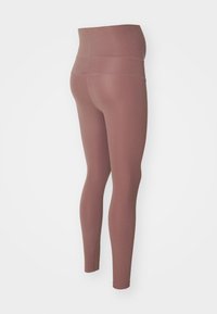 Women’s mauve maternity leggings with a high, supportive waistband and full-length fitted legs shown from the side.