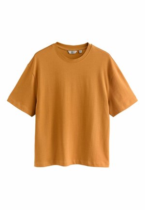 Short-sleeve T-shirt in mustard yellow cotton. Relaxed fit with a round neckline and smooth texture. Simple design, no patterns or accents.