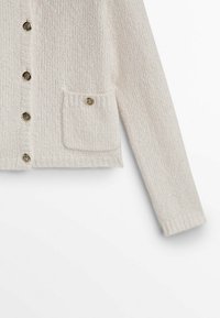 Licht beige, gestructureerde cardigan met een ronde halslijn, voorzien van gouden knopen en één voorzak.