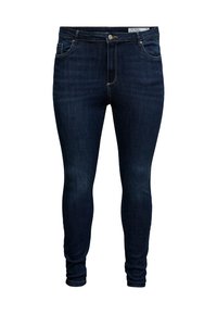 Skinny-fit jeans in donkerblauwe denim. Voorzien van vijf zakken, een metalen knoopsluiting en subtiele stikseldetails langs de naden en zakken.