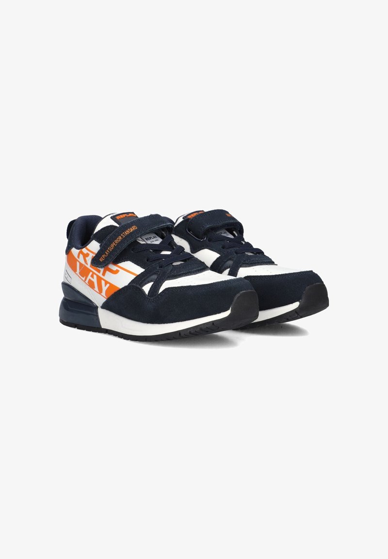Navy blue and white athletic shoes with suede and mesh materials, featuring orange accents and Velcro straps for closure.
