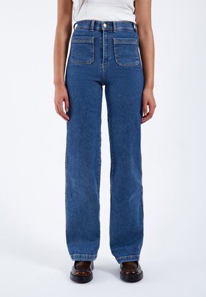 High-waisted, wide-leg blue jeans in denim fabric with four pockets, a button closure, and subtle fading at the legs.