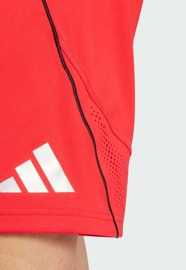 TIRO 25 PRO - Sports shorts - pure ruby2