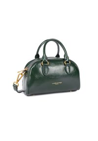 Dark green leather handbag with rounded shape, dual handles, adjustable shoulder strap, gold hardware, and embossed logo on the front.