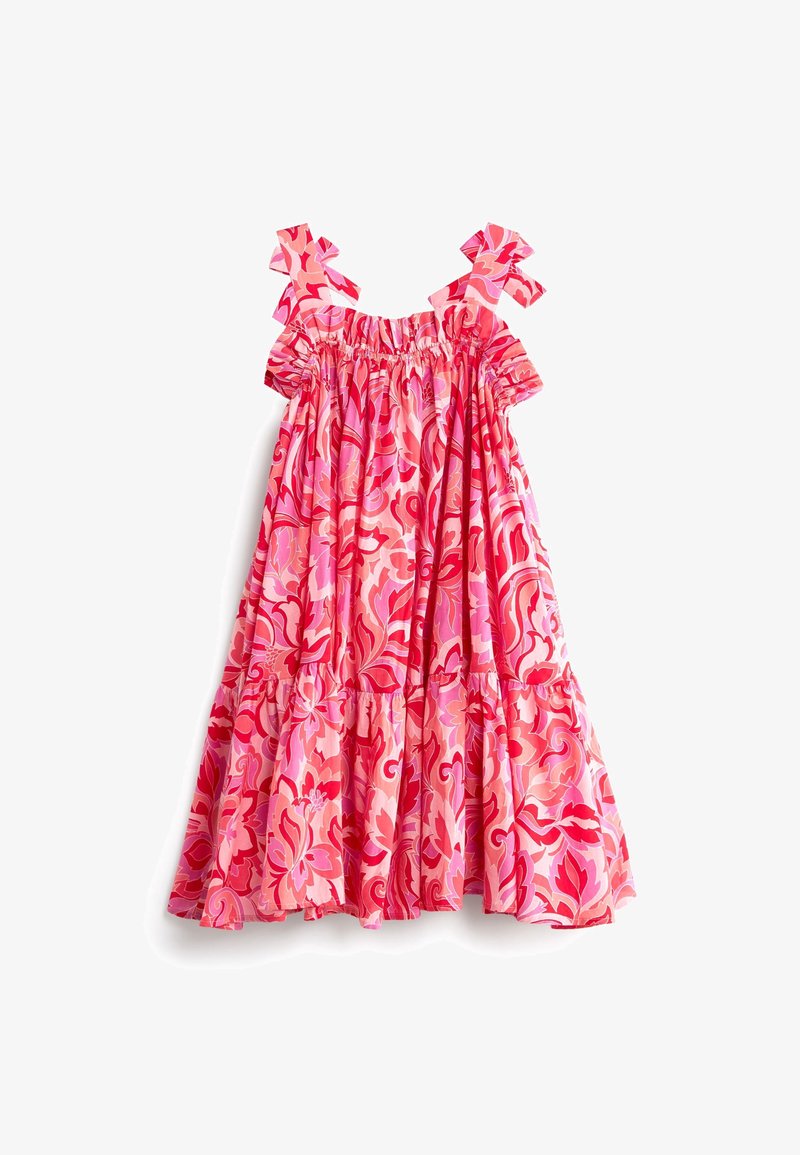 Robe florale rose avec bretelles à volants, corsage froncé et jupe à volants. Le tissu présente des motifs tourbillonnants dans différentes nuances de rose.
