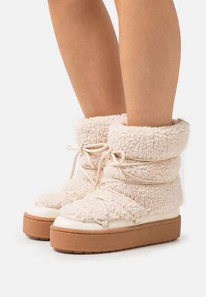 Enkellaarsjes met plateauzool - beige