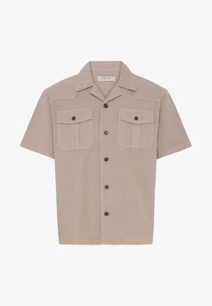 Beige short-sleeve button-up shirt with two front flap pockets and a classic collar, made from textured fabric.
