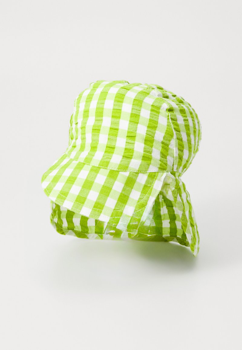 Grön och vit rutigt bucket hat med en mjuk tygtextur, en böjd skärm och sidoflappar för solskydd.