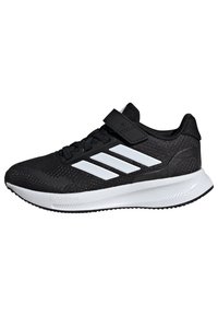 Scarpe sportive nere con tomaia in mesh, dettagli bianchi, tessuto texturizzato, chiusura con lacci e cinturino in Velcro per una maggiore sicurezza. Suola in gomma.