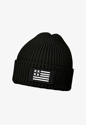Black knit beanie with ribbed texture, featuring a rectangular black patch that displays a white flag design with horizontal stripes and symbols.