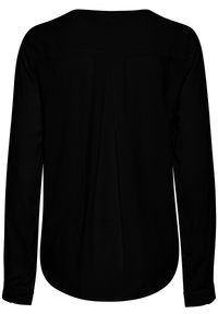Chemise noire à manches longues avec un motif texturé subtil et un pli central dans le dos, vue de dos.