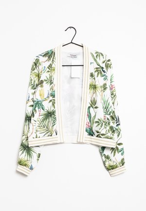 Witte open voorkant jas met groene tropische blad- en bloemenprint, gouden gestreepte afwerking op kraag, manchetten en zoom, hangend aan een zwarte hanger.