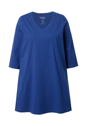 Blå bomulds tunika med V-hals og trekvartærmer. Har en let A-formet silhuet og diagonale sømdetaljer på forsiden.