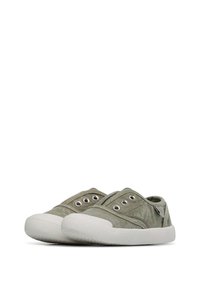 Green slip-on canvas toddler shoes with white rubber soles and metal eyelets, shown side by side on a white background.