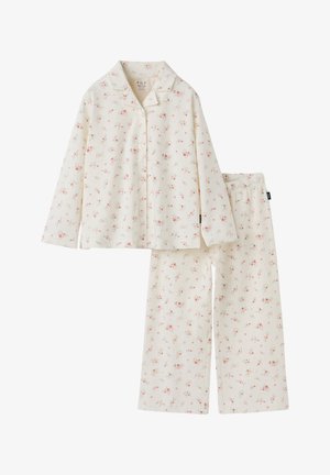 To-delt cremefarvet børnepyjamas med lange ærmer og bukser, med et lille lyserødt blomsterprint og knapper foran.