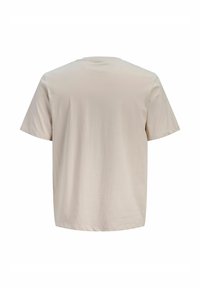 T-shirt beige uni à manches courtes, vue de dos, avec un col rond et une coupe décontractée.