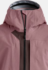 Light pink waterproof jacket with a high collar and adjustable hood. Features a central zip and contrasting dark brown panel detail.