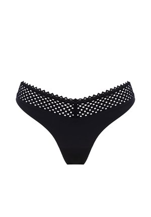 Perizoma nero con fascia in pizzo a pois e texture. Tessuto liscio con design a vita bassa e bordi smerlati sulla fascia.