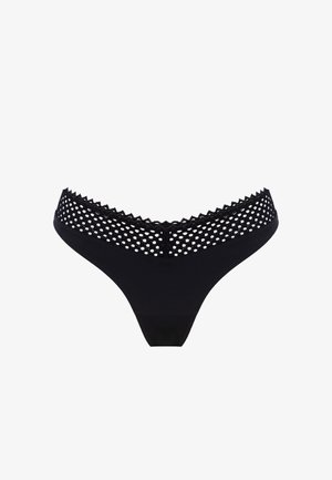 Zwarte string met een getextureerde, gestippelde kanten tailleband. Gladde stof met een laag uitgesneden ontwerp en gekartelde randen aan de tailleband.