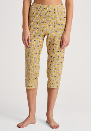 Geel capri-broek met een bloemmotief, voorzien van witte en paarse accenten. Elastische tailleband voor comfort, gladde textuur.